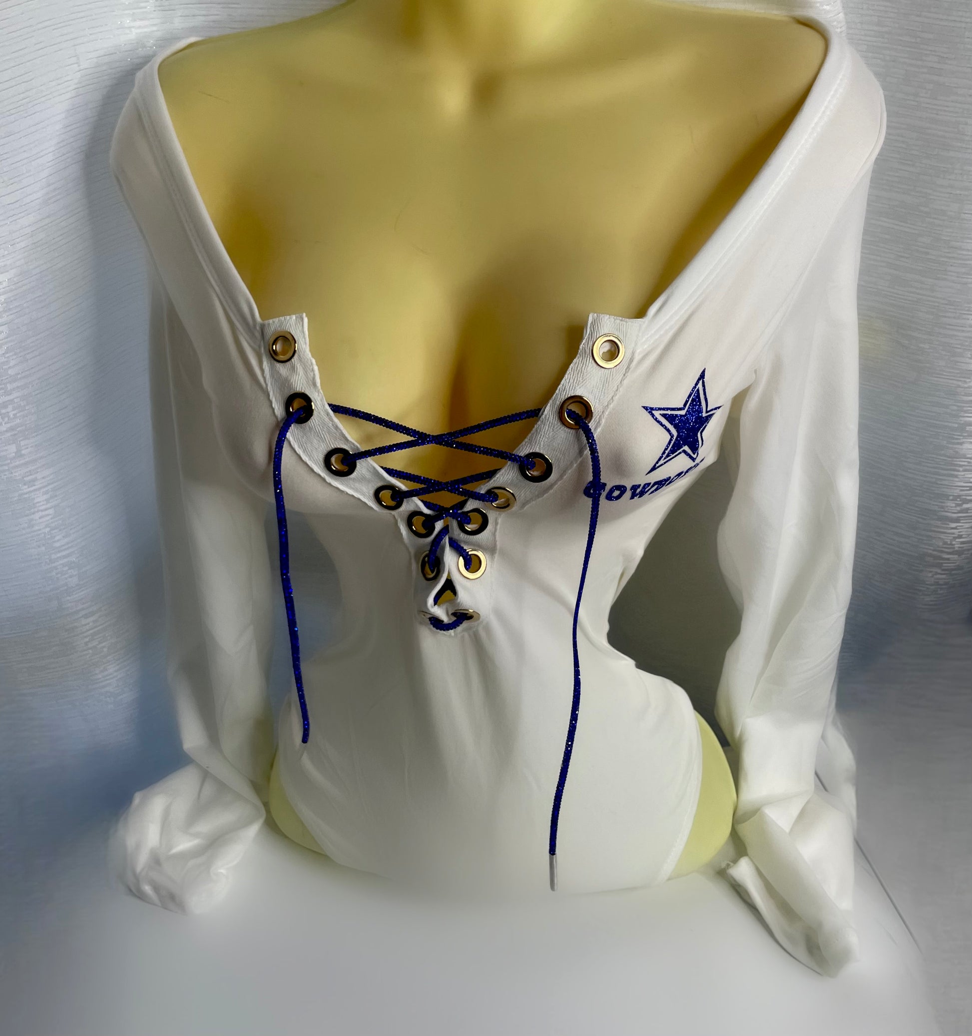 Cowboys On and Off Bodysuit (White) with grommet cut trim.